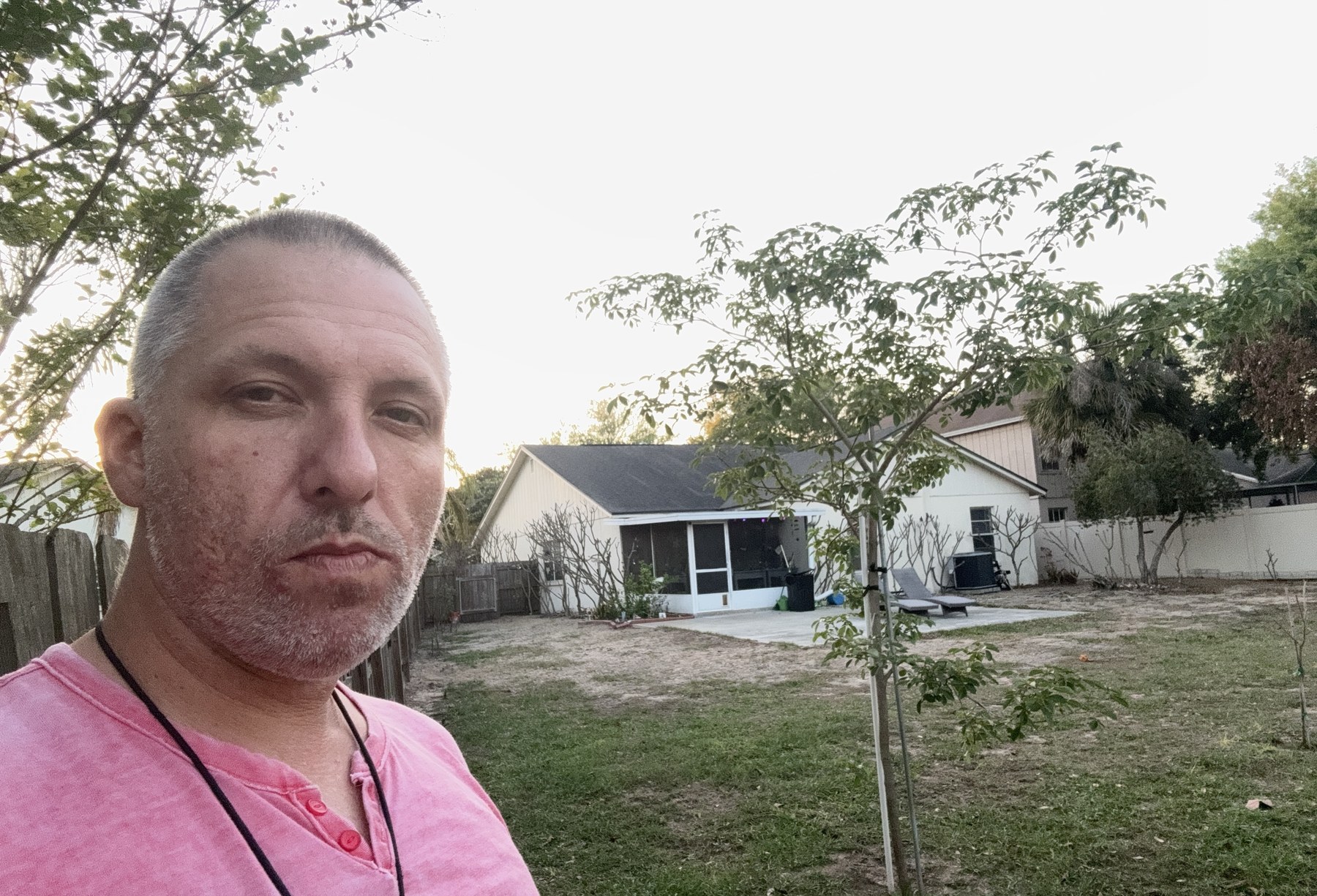 Adam outside in the yard